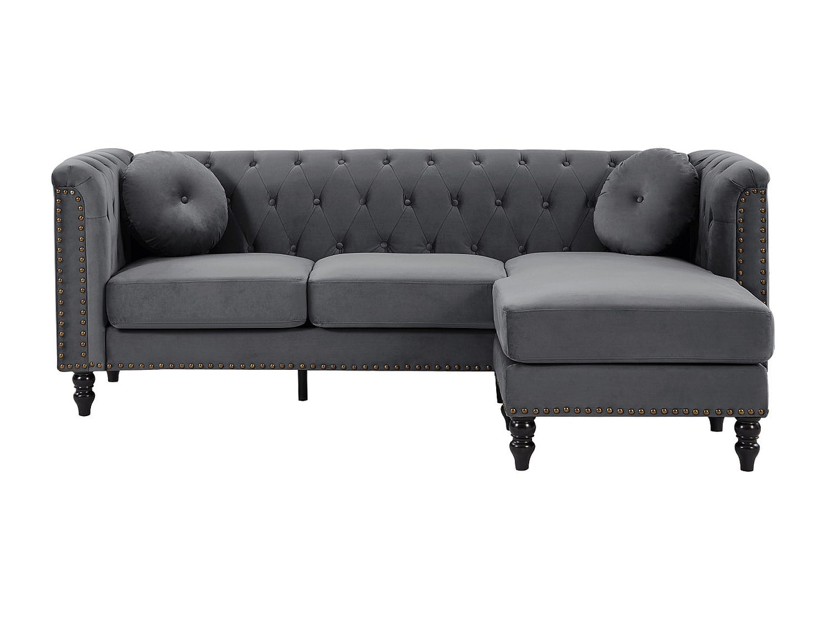 Capitonnage du canapé d'angle chesterfield TURNER velours anthracite