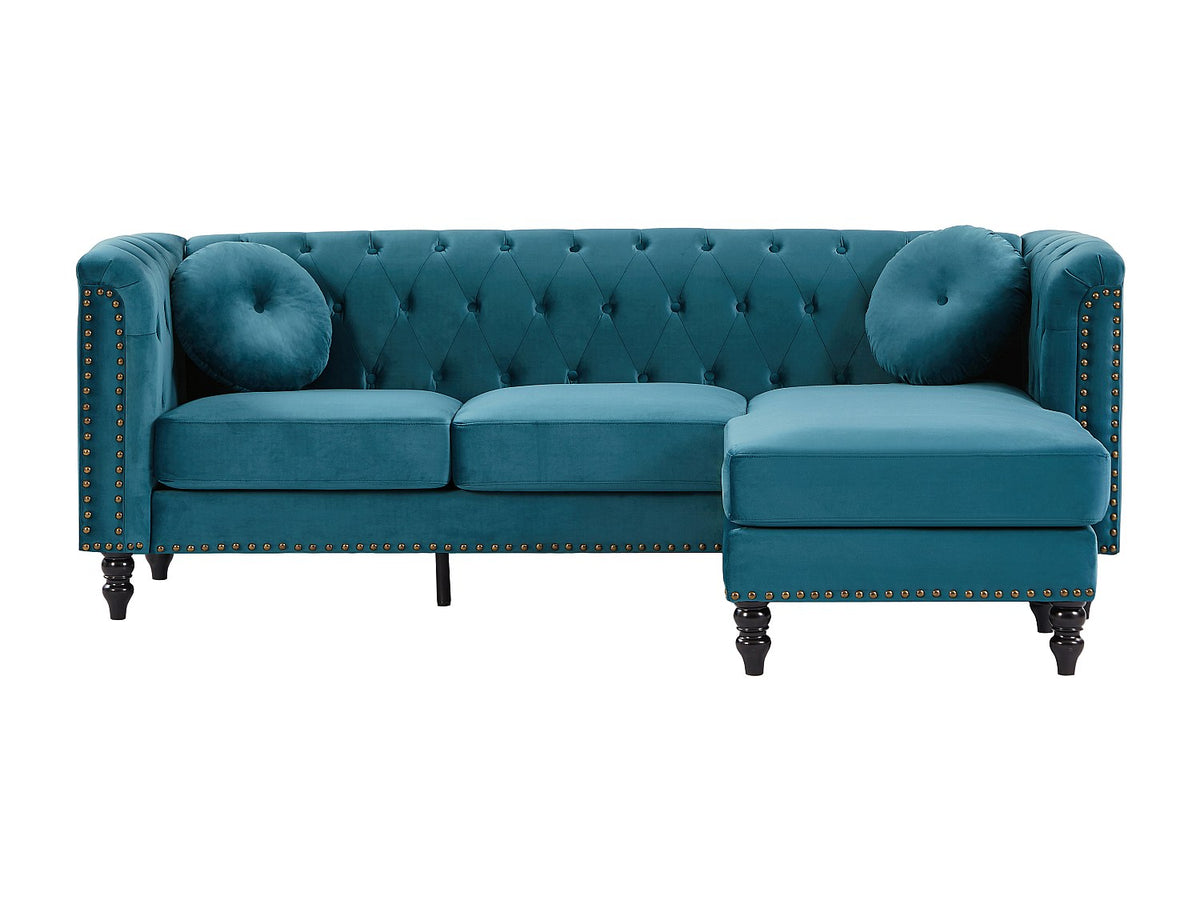 Capitonnage et clous du canapé d'angle chesterfield TURNER bleu canard