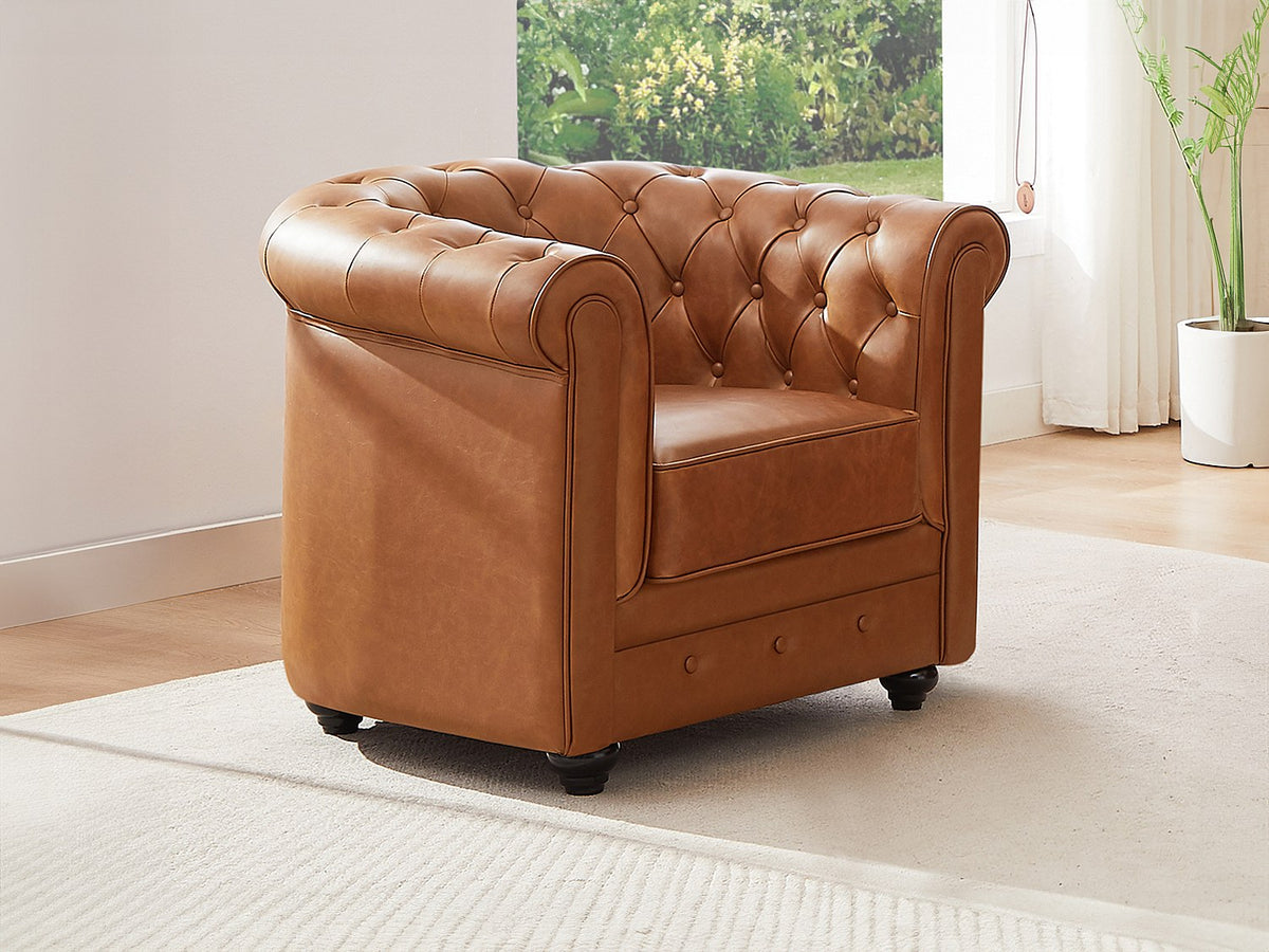 Capitonnage profond du fauteuil chesterfield THAMES en cuir camel