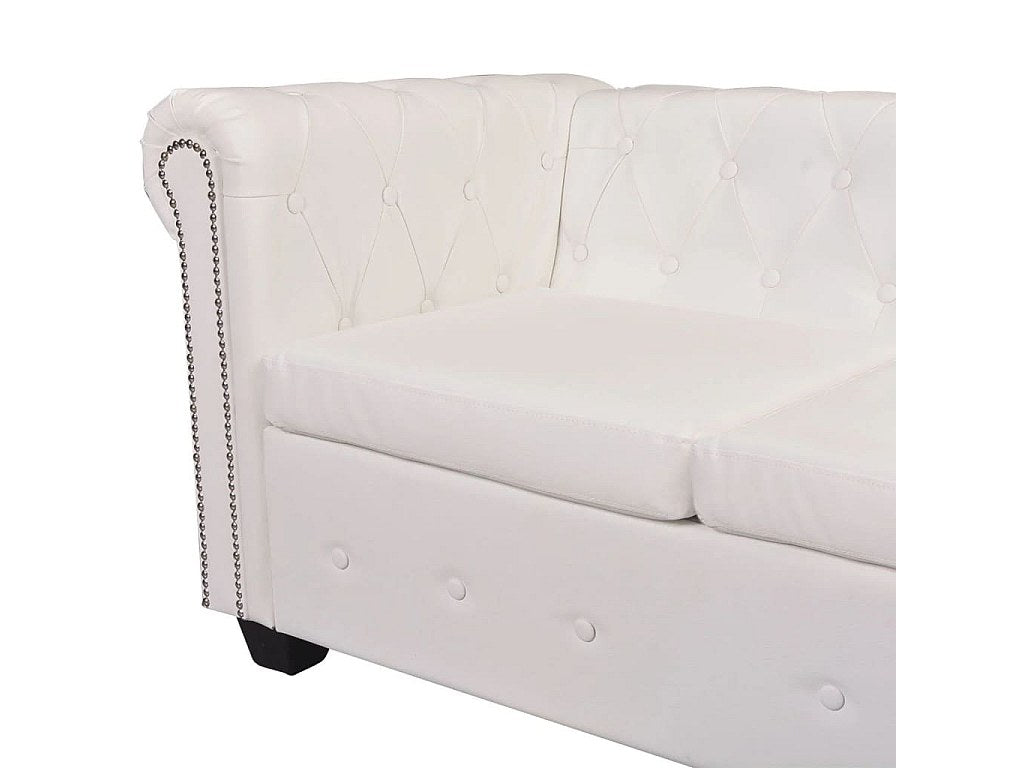 Angle du canapé chesterfield BRISTOL blanc dans un salon lumineux