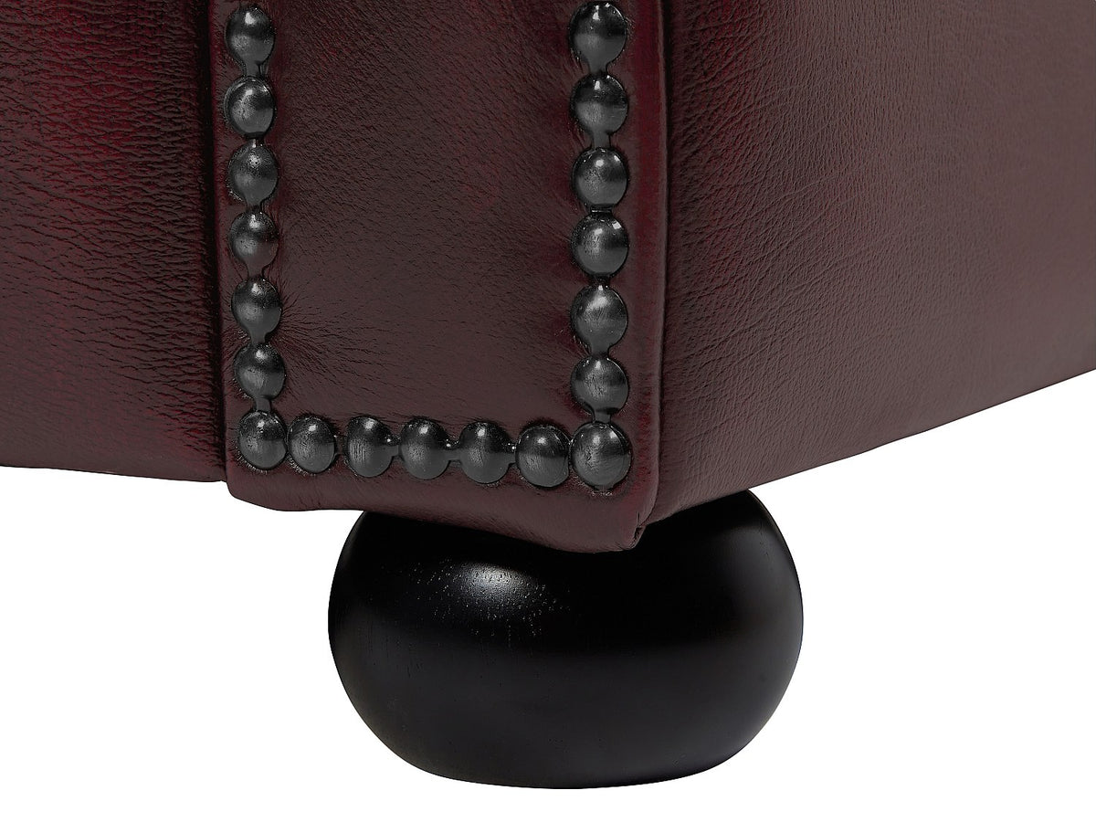 Canapé d'angle gauche chesterfield BRENTON dans un salon chaleureux