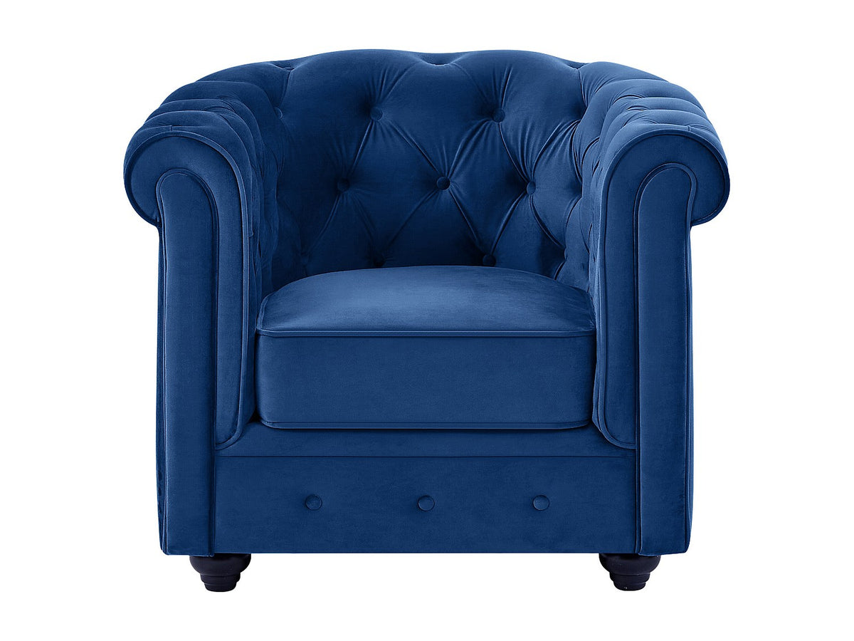 Capitonnage du fauteuil chesterfield WICKHAM en velours bleu roi