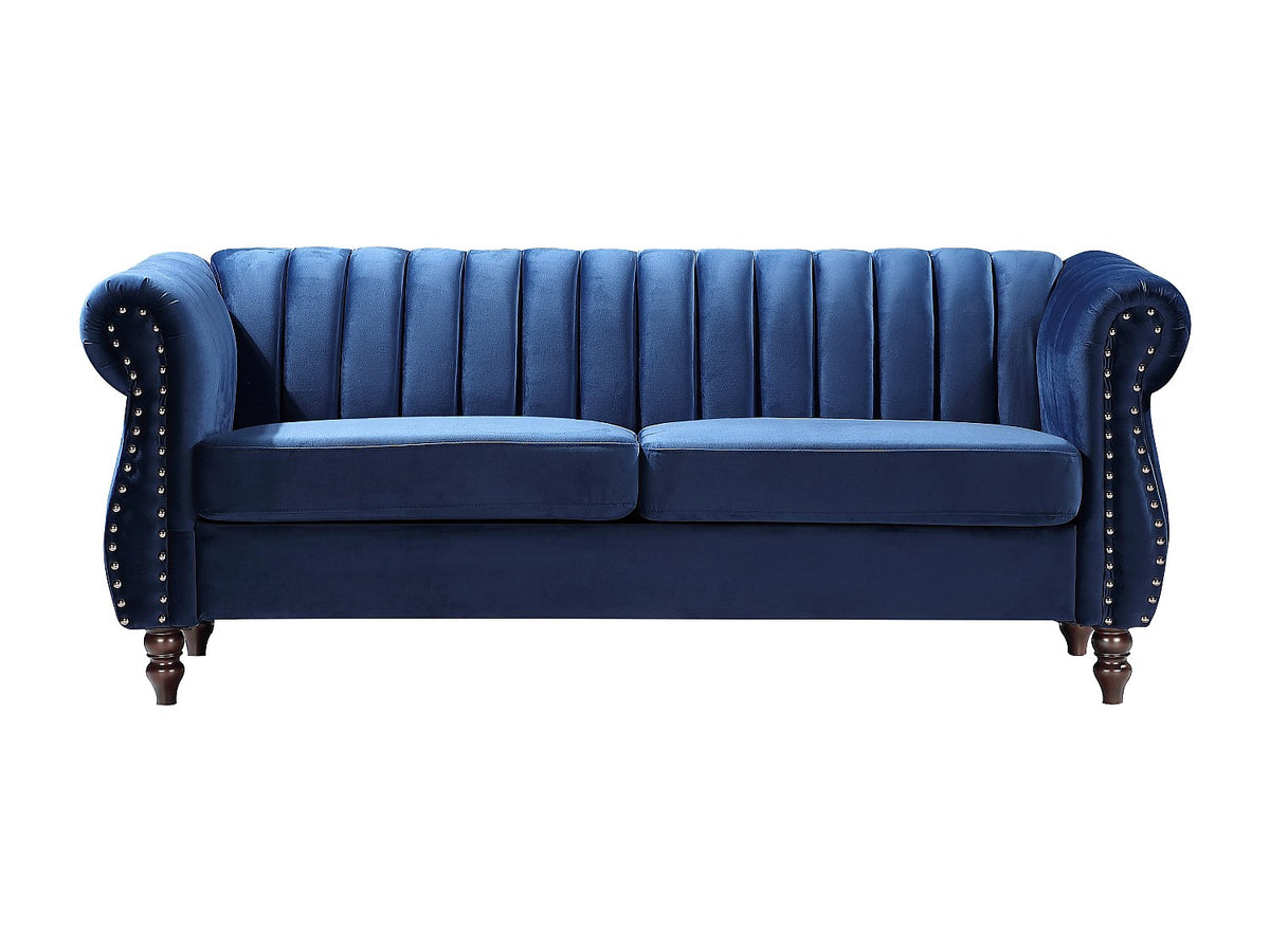 Capitonnage et finitions cloutées du canapé chesterfield TRUMBO bleu roi