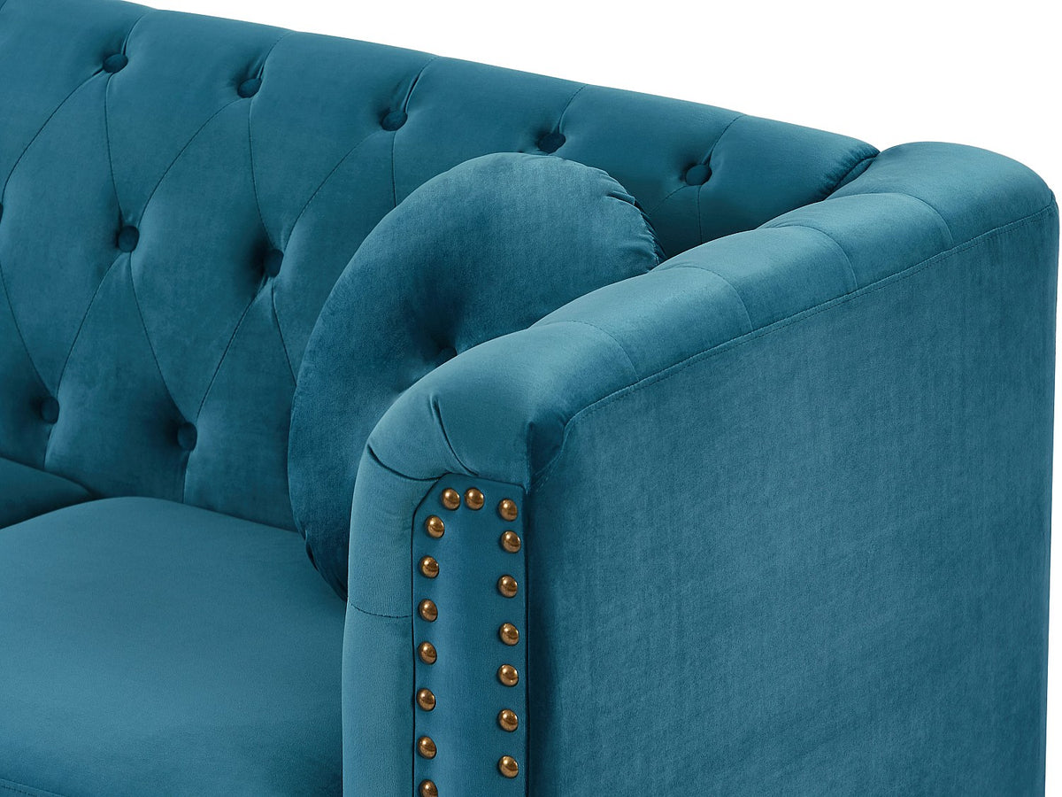 Accoudoirs arrondis du canapé d'angle chesterfield TURNER en velours