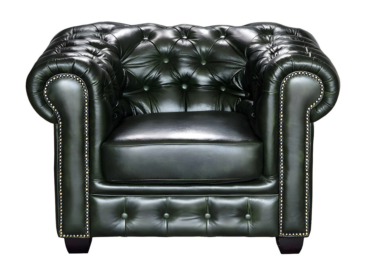 Capitonnage et accoudoirs cloutés du fauteuil chesterfield BRENTON vert sapin