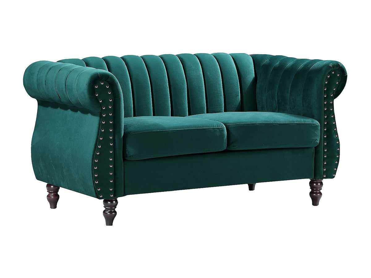 Capitonnage et finitions cloutées du canapé chesterfield TRUMBO vert émeraude