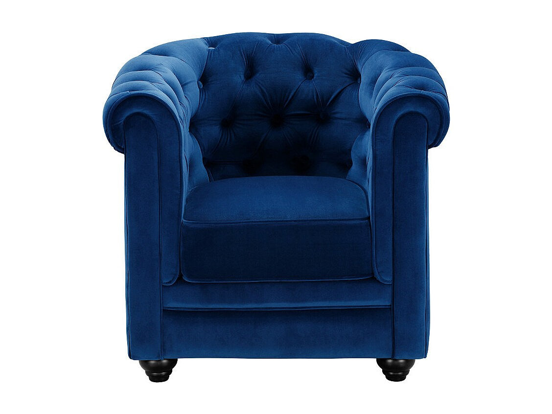 Capitonnage des fauteuils chesterfield RADLEY en velours bleu roi