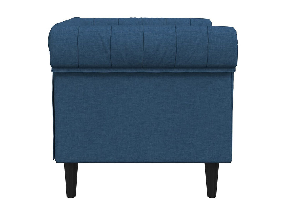 Détail du tissu bleu du fauteuil chesterfield MARLOW