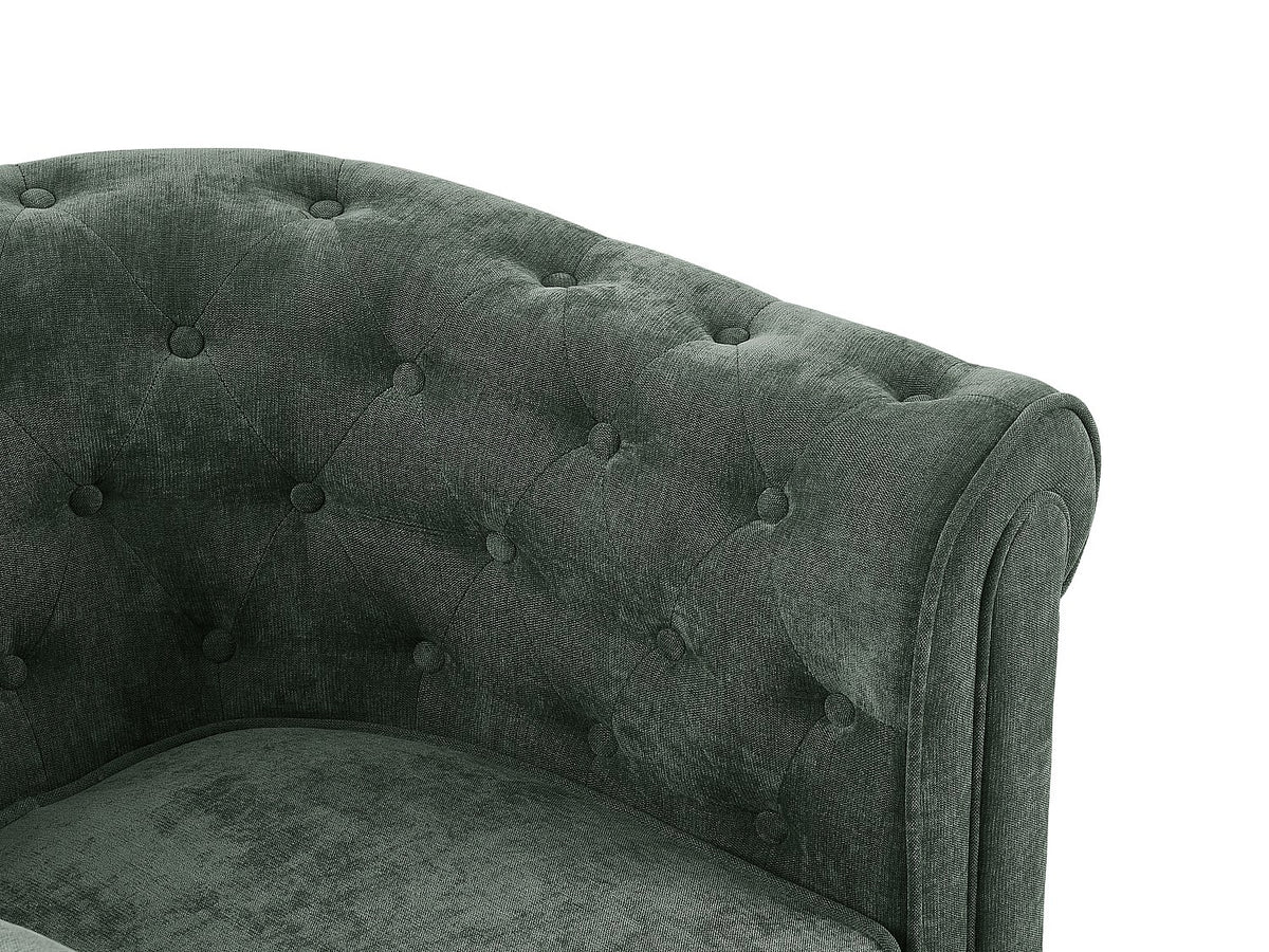 Détail du tissu vert des fauteuils chesterfield WALTON
