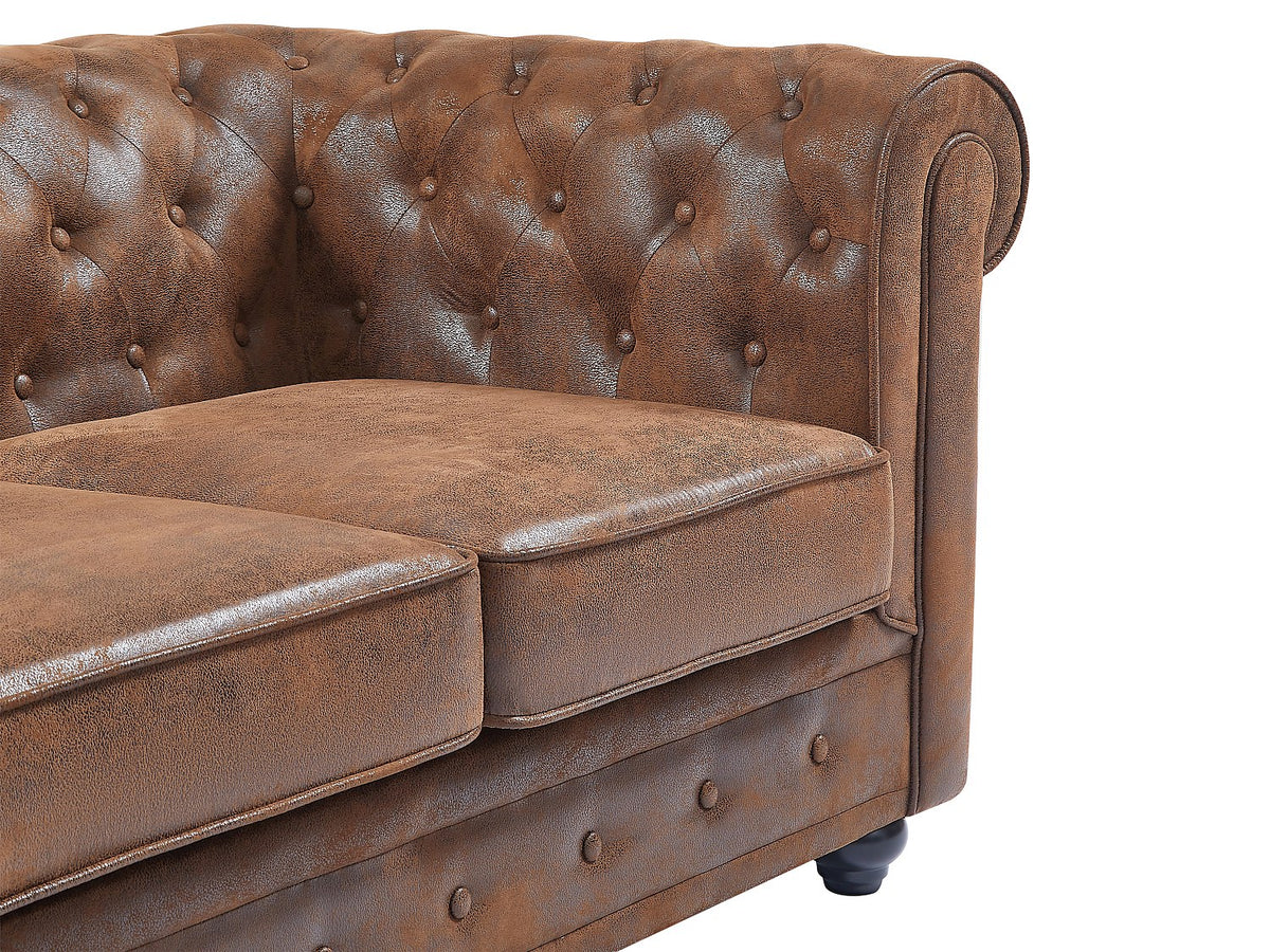 Accoudoirs roulés du canapé chesterfield CARLTON aspect cuir vieilli