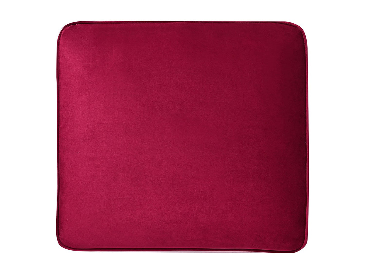 Fauteuil chesterfield OSWALD rouge foncé dans un salon rétro