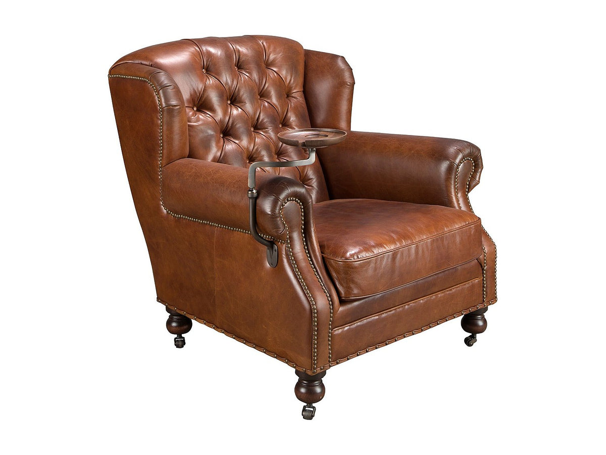 Capitonnage du fauteuil chesterfield ANGEL CERDA en cuir marron cognac