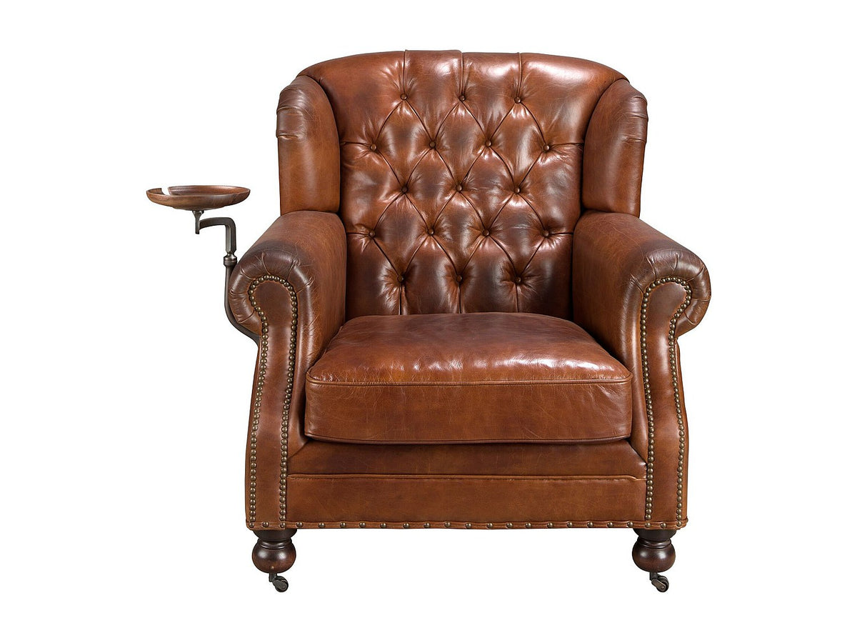 Accoudoirs arrondis du fauteuil chesterfield ANGEL CERDA marron cognac