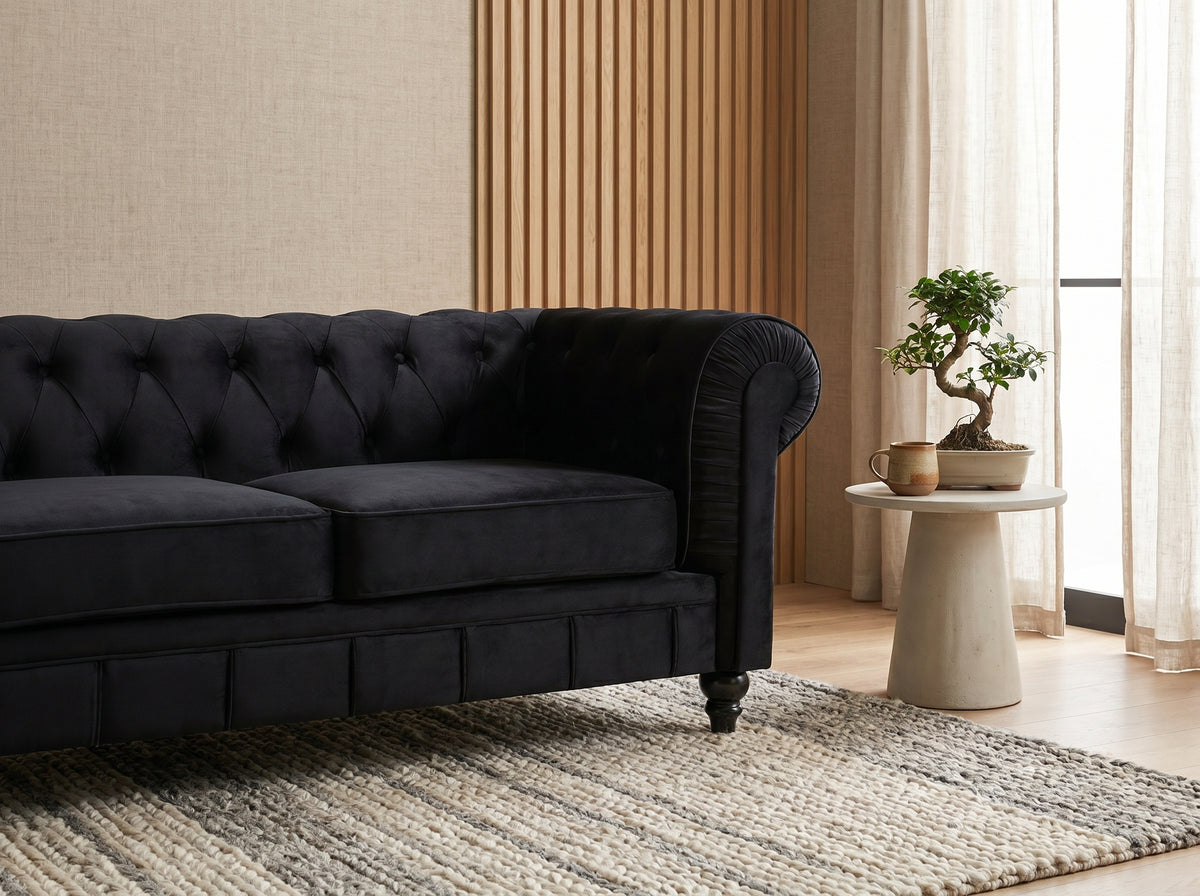 Accoudoirs arrondis du canapé chesterfield ALTESSE noir